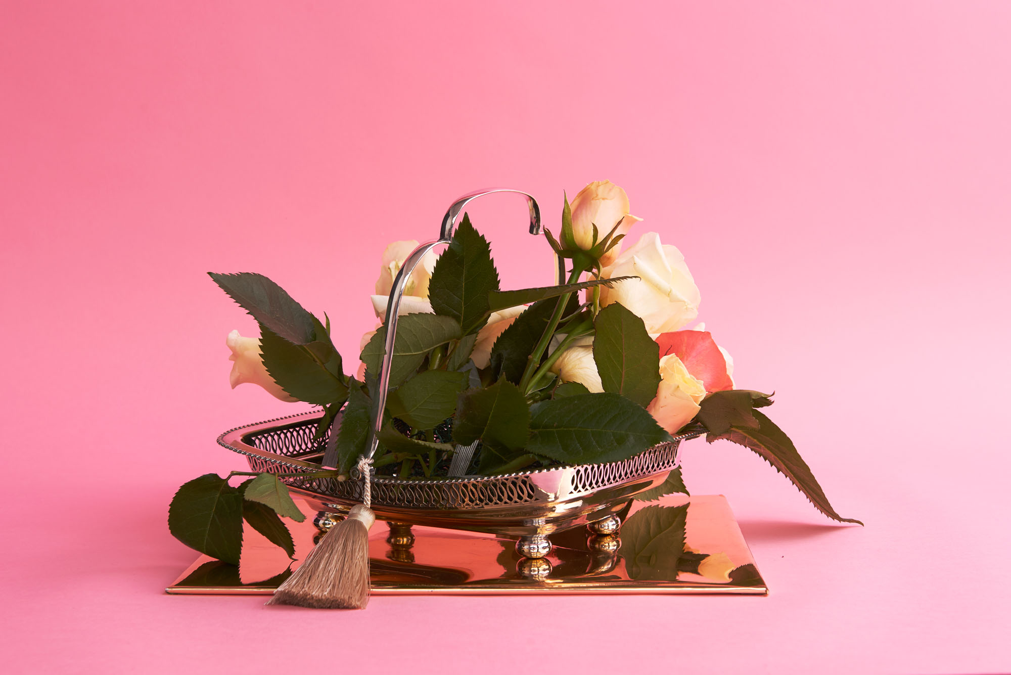Arrangement of roses in rectangular dish, (reverse)